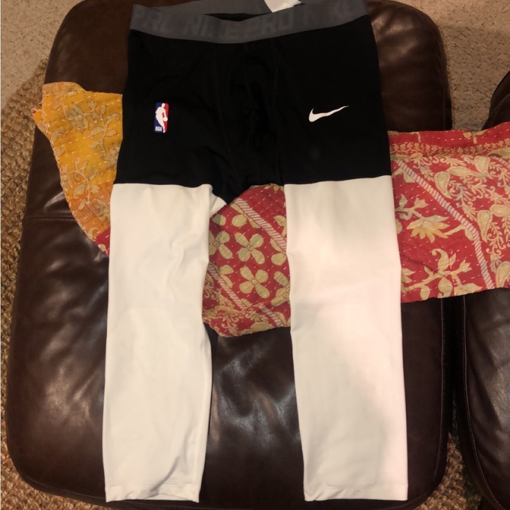 Black and white 3/4 cut tights.